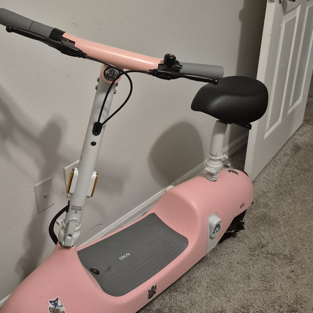 OKAI scooter pink and goes at least 20